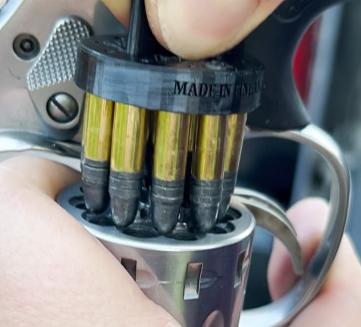 SpedeLoader loading .22 LR into a 10-shot S&W 617 cylinder